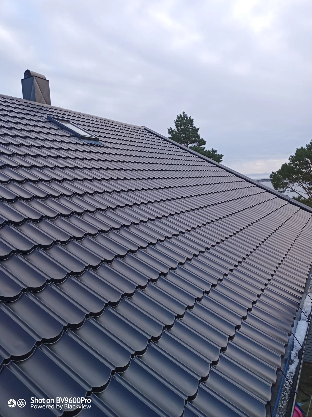 Newly installed dark roof tiling project