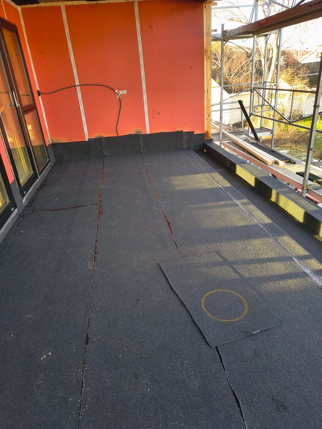 Flat roof waterproofing membrane installation marked