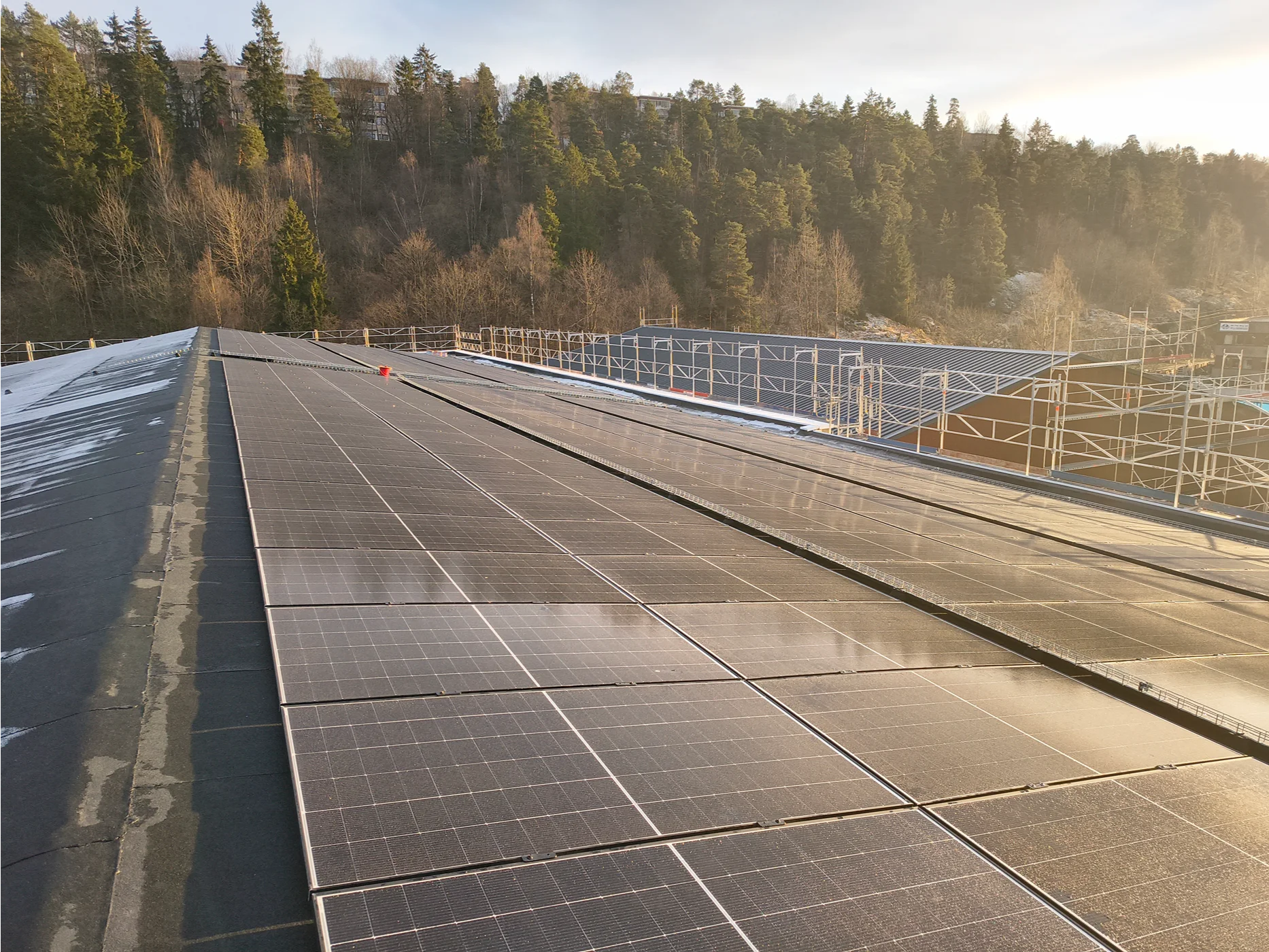 Solar panel installation on building rooftop