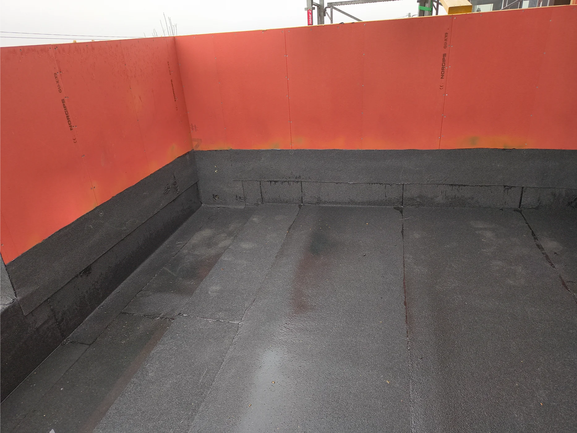 Waterproofed container interior with protective coating