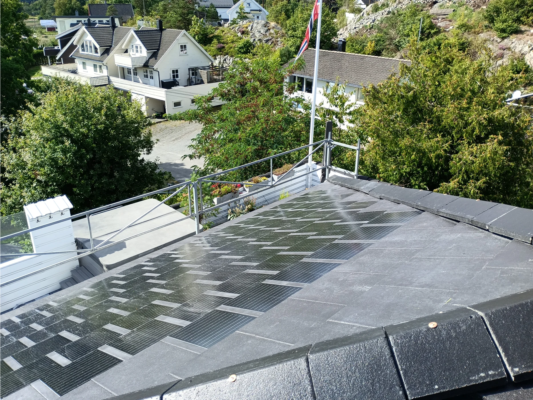 Modern rooftop terrace with geometric paving design